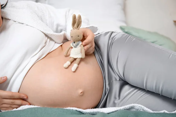 Young Pregnant Woman Toy Lying Bedroom Closeup — Stock Photo, Image