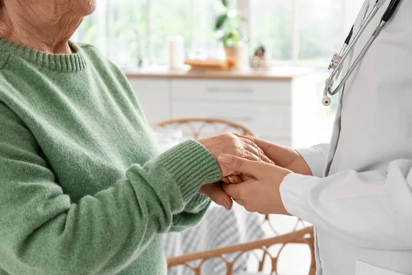 Senior Woman Female Doctor Holding Hands Home Closeup — Stock Photo, Image