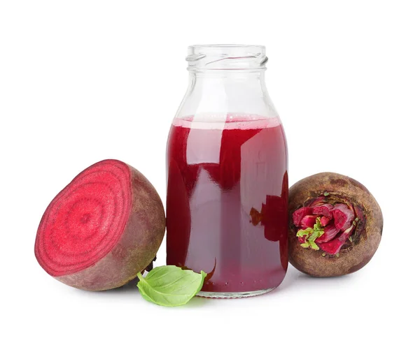 stock image Bottle of healthy beet juice and spinach on white background