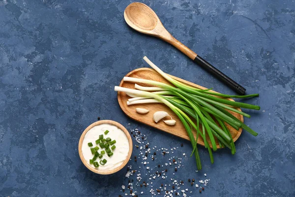 Bowl Tasty Sour Cream Board Green Onion Blue Background — Stock Photo, Image