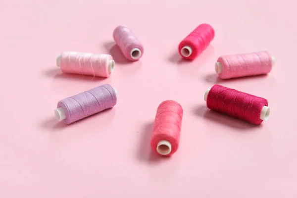 Frame Made Different Thread Spools Pink Background Stock Photo