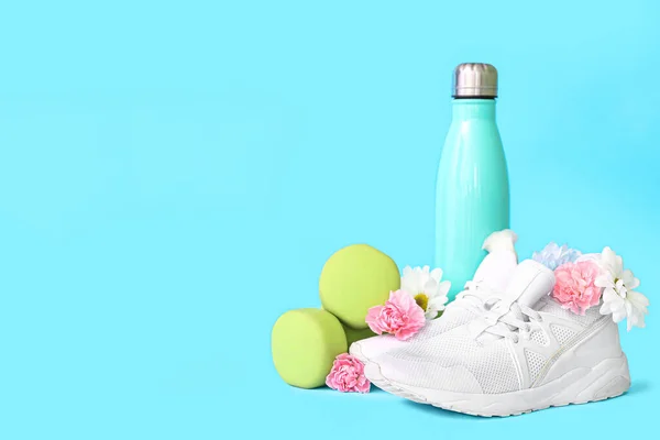 Sneakers Spring Flowers Bottle Blue Background — Stock Photo, Image
