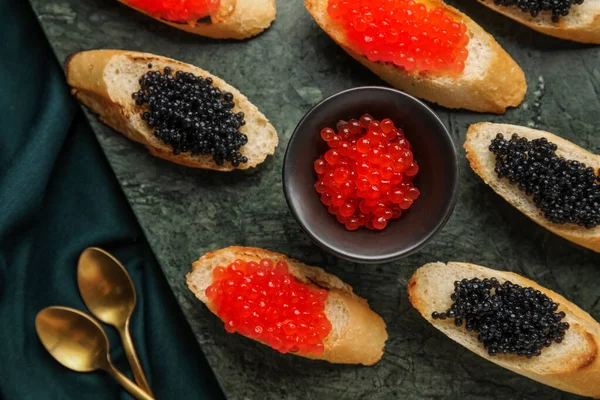 Tasty Bruschettas Red Black Caviar Color Background — Stock Photo, Image