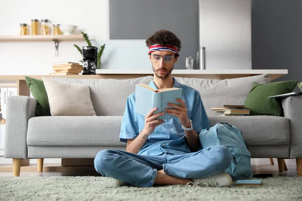 Male Student Reading Book Home — Stock Photo, Image