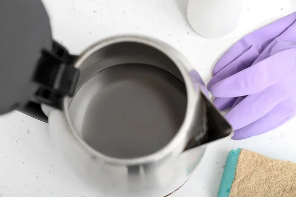 Electric Kettle Limescale Purple Rubber Gloves White Table Closeup — Stock Photo, Image
