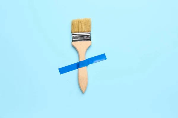 Paint Brush Adhesive Tape Blue Background — Stock Photo, Image