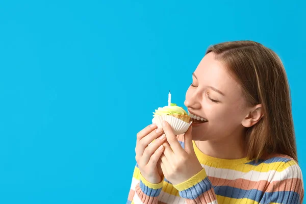 Beautiful Young Woman Eating Tasty Birthday Cake Blue Background — Stock Photo, Image