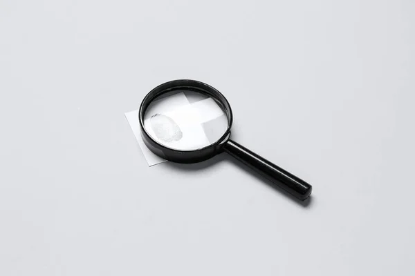 Magnifier Paper Fingerprint Grey Background Detective Concept — Stock Photo, Image
