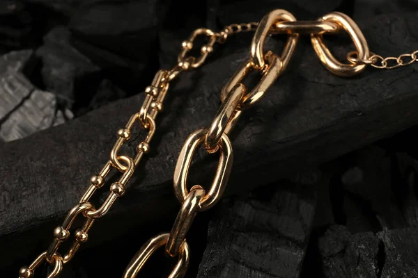 Beautiful Chain Bracelets Black Charcoal Closeup — Stock Photo, Image
