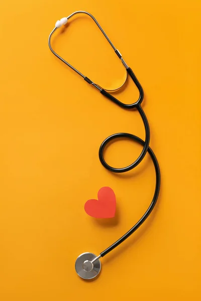 Stethoscope Red Heart Yellow Background Cardiology Concept — Stock Photo, Image
