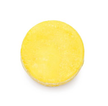 Beyaz arkaplanda sarı, katı şampuan çubuğu