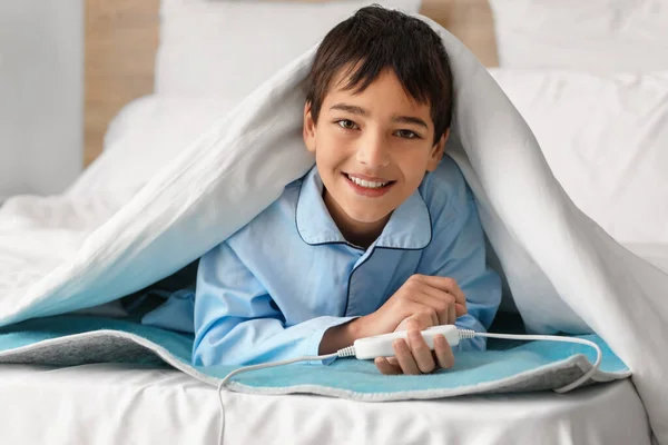 Little Boy Lying Blanket Electric Heating Pad Bedroom — Stock Photo, Image