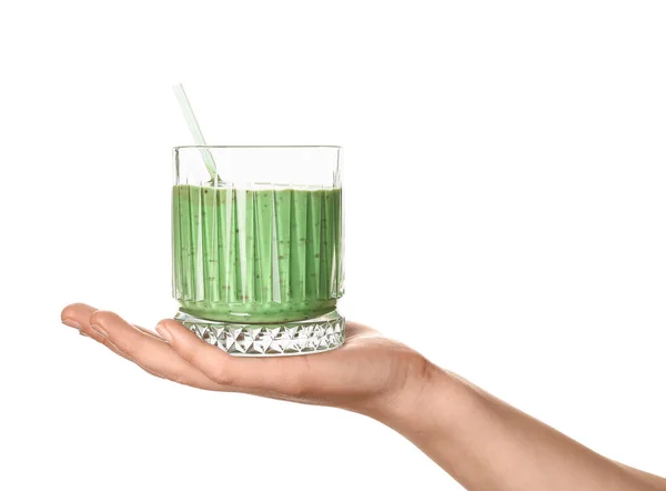 白い背景に緑のスムージーのガラスと女性の手 — ストック写真