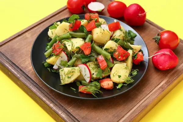 Plate Tasty Potato Salad Vegetables Yellow Background — Stock Photo, Image
