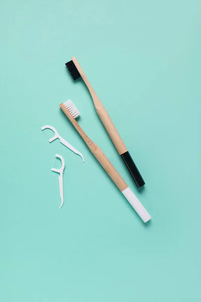 Bamboo Toothbrushes Toothpicks Turquoise Background — Stock Photo, Image
