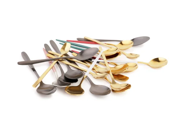 stock image Stainless steel and golden spoons with colorful handles on white background