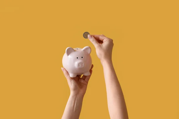 Woman Coin Piggy Bank Yellow Background — Stock Photo, Image