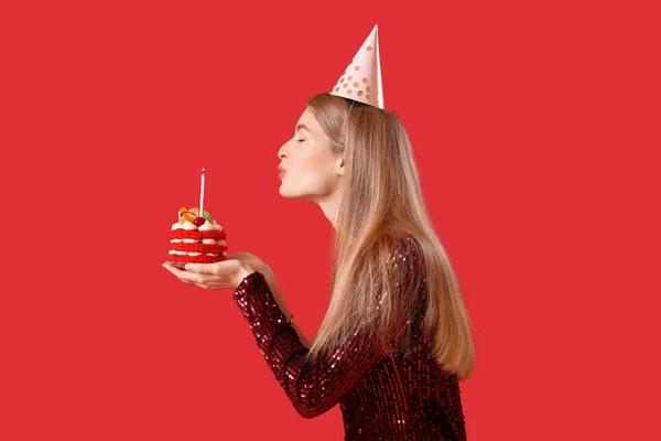 Young Woman Birthday Cake Making Wish Red Background — Stock Photo, Image