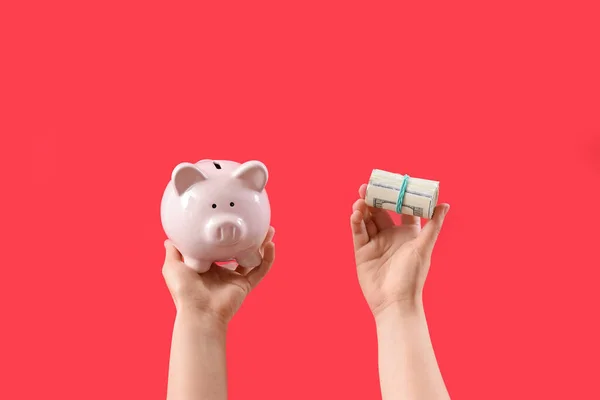 Woman Piggy Bank Money Red Background — Stock Photo, Image