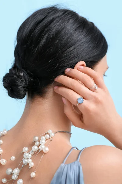 Young Woman Beautiful Jewelry Blue Wall — Stock Photo, Image