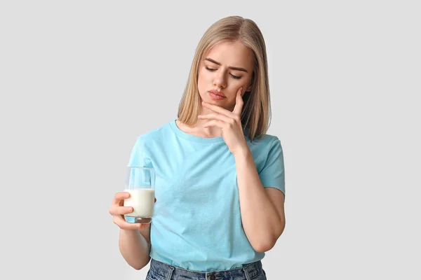 Thoughtful Young Woman Glass Milk Grey Background — Stock Photo, Image