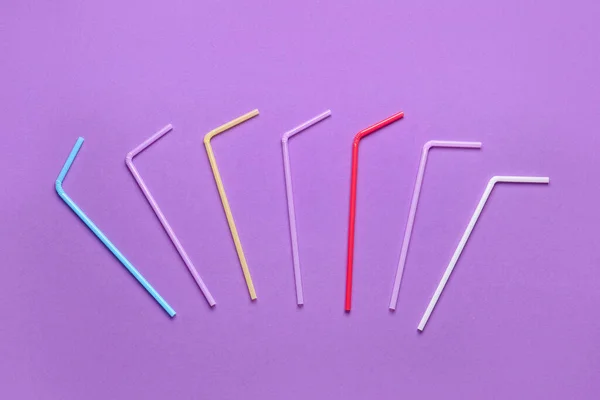 Different Plastic Straws Purple Background — Stock Photo, Image