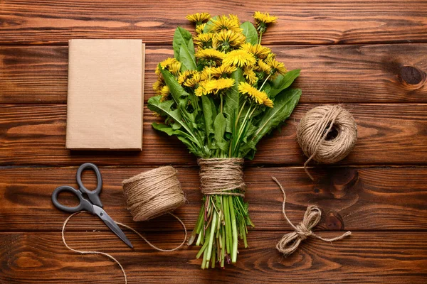 Bouquet Beautiful Dandelion Flowers Rope Scissors Book Wooden Background — Stock Photo, Image