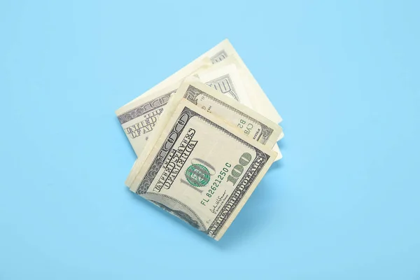 Billetes Cien Dólares Sobre Fondo Azul —  Fotos de Stock