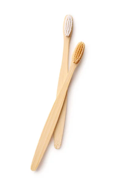 stock image Different bamboo toothbrushes on white background