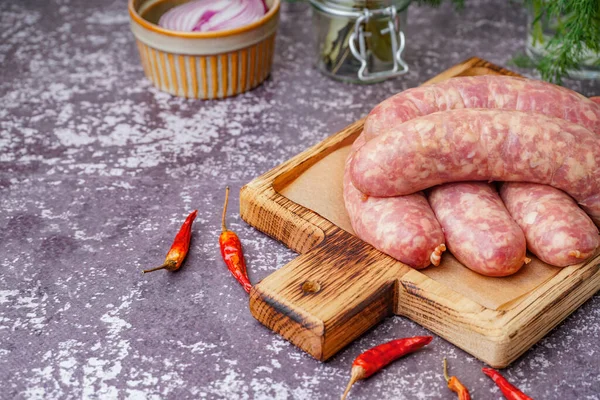 Wooden Board Raw Homemade Sausages Grunge Background — Stock Photo, Image