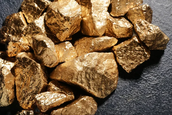 stock image Golden nuggets on dark background, closeup