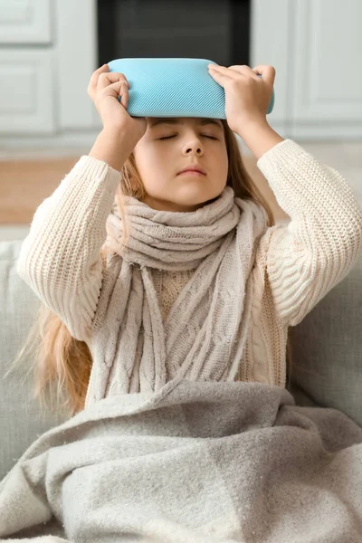 Ill Girl Warming Her Head Hot Water Bottle Sofa Home — Stock Photo, Image