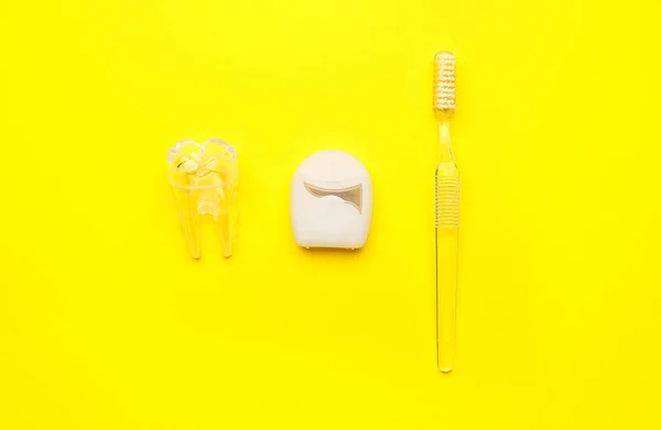 Dental Floss Plastic Tooth Model Brush Yellow Background — Stock Photo, Image