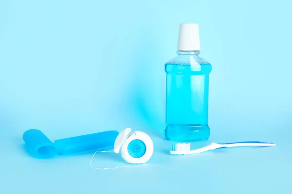 Dental Floss Toothbrush Rinse Blue Background — Stock Photo, Image
