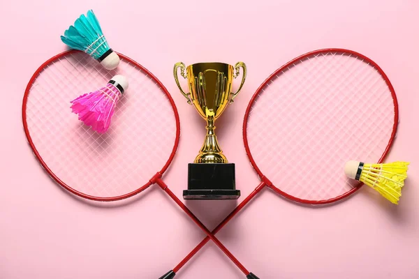 Gold Cup Badminton Rackets Shuttlecocks Pink Background — Stock Photo, Image