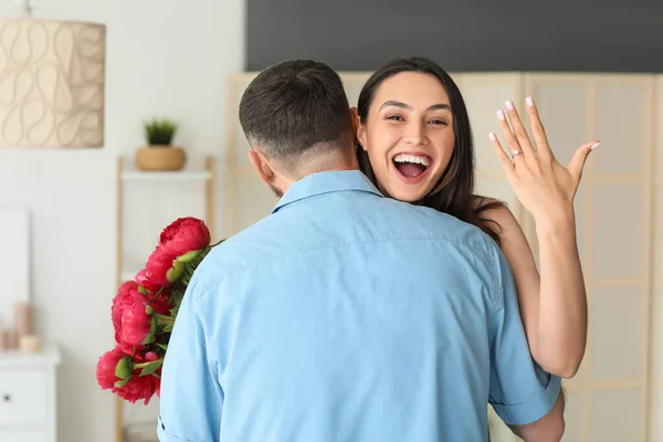 Happy Engaged Couple Hugging Home — Stock Photo, Image