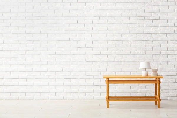 Wooden Table Lamp Decorative Figure White Brick Wall — Stock Photo, Image