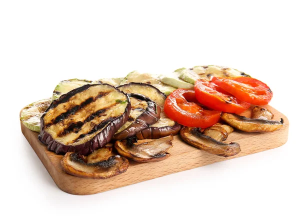 stock image Wooden board with different tasty grilled vegetables on white background