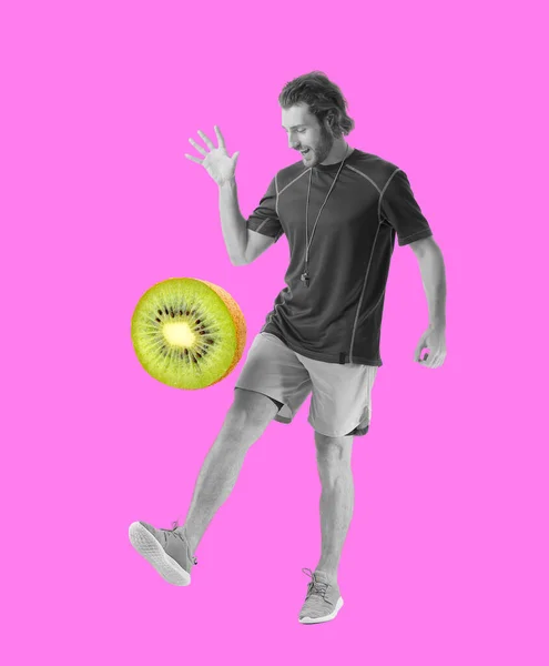 Sportig Manlig Tränare Med Färsk Kiwi Färg Bakgrund — Stockfoto