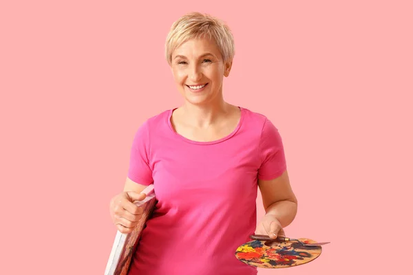 Mature Female Artist Tools Picture Pink Background — Stock Photo, Image