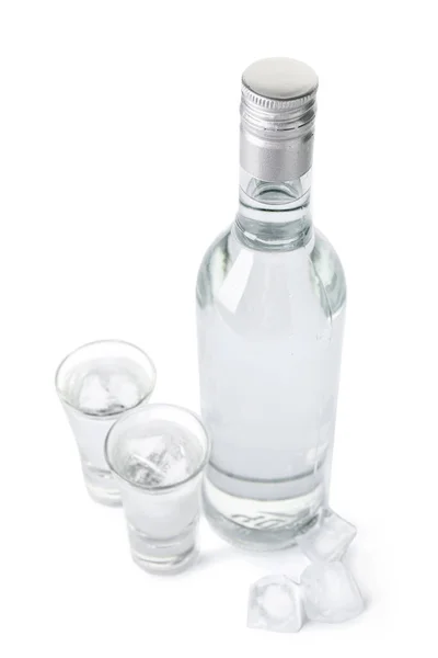 stock image Bottle and glasses of vodka isolated on white background