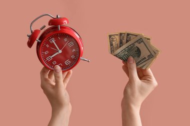 Woman with alarm clock and dollar banknotes on color background clipart