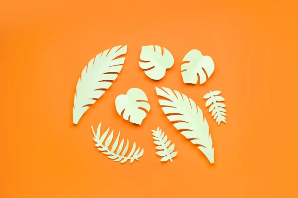 Light Paper Tropical Leaves Orange Background — Stock Photo, Image