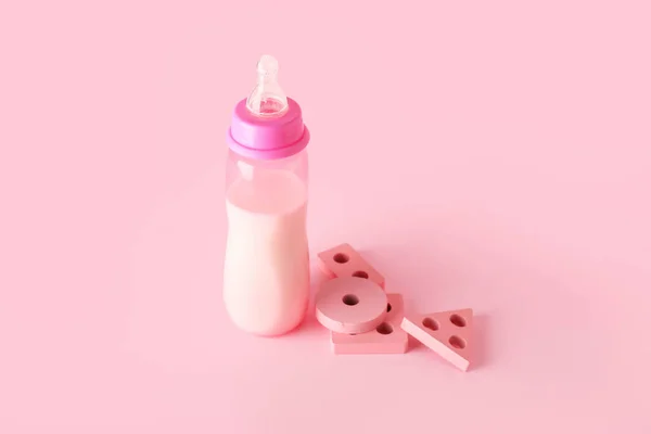 Bottle Milk Baby Toys Pink Background — Stock Photo, Image