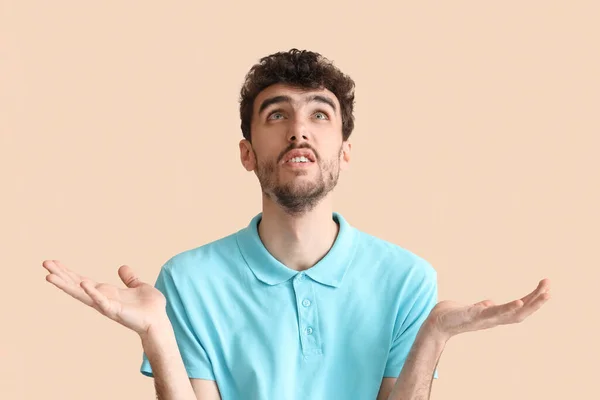 Stressed Young Man Beige Background — Stock Photo, Image