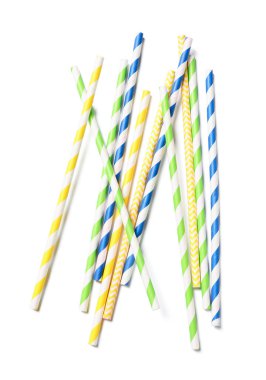 Different paper drinking straws on white background clipart