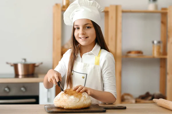 Little Baker Cutting Fresh Bread Kitchen — Stock Photo, Image