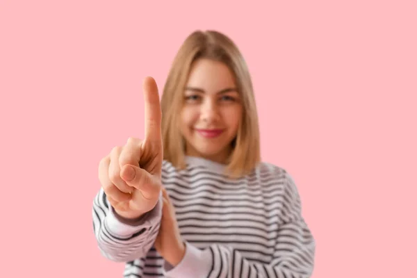 Young Woman Striped Sweatshirt Showing One Finger Pink Background Closeup — Stock Photo, Image