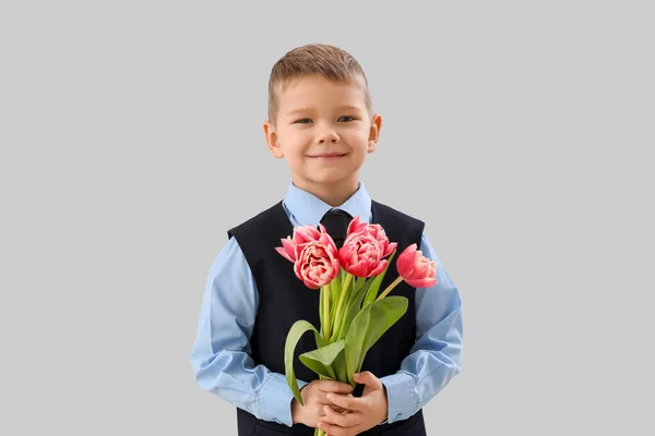 Cute Little Boy Suit Tulips Grey Background — Stockfoto