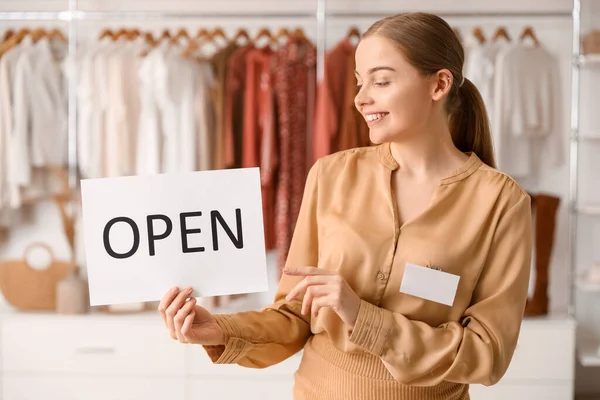 Female Seller Opening Sign Boutique — Stock Photo, Image